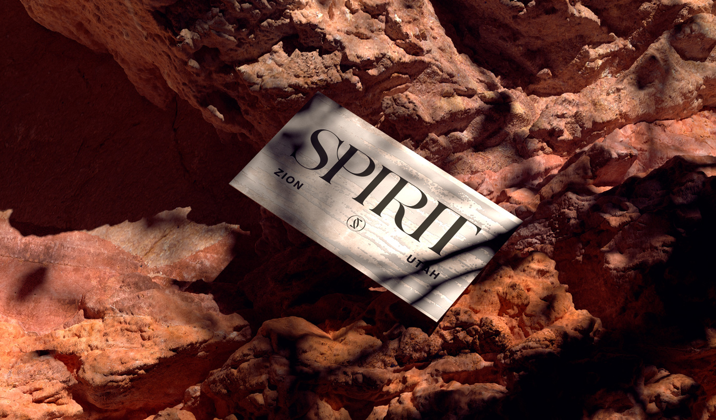 Business card lying on red rock